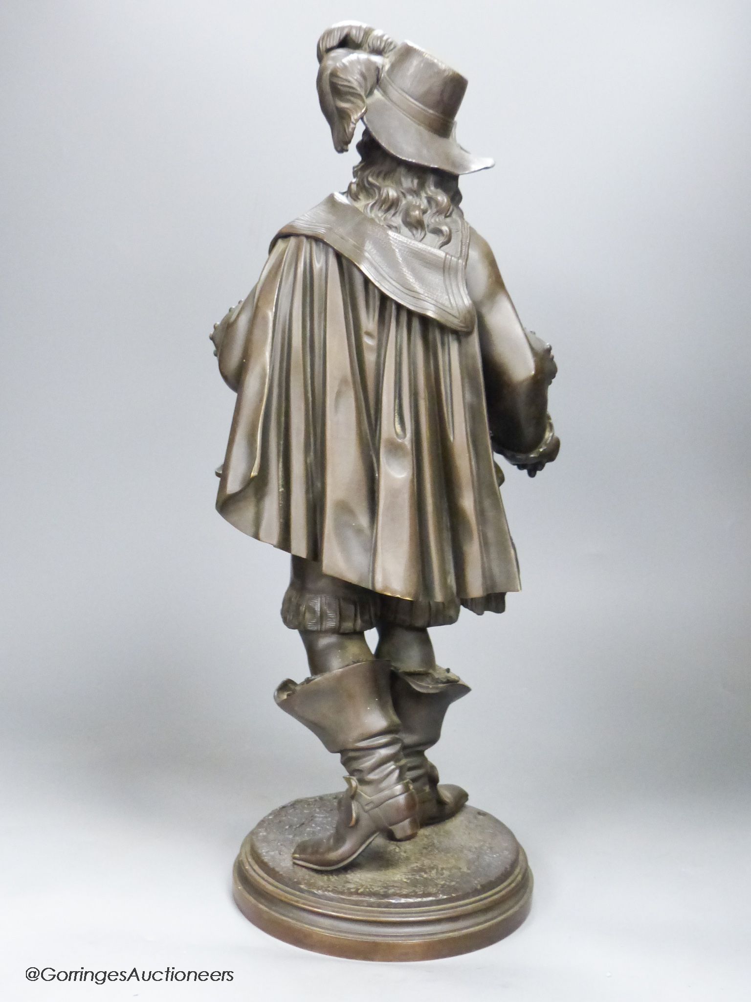 An early 20th century bronze figure of a cavalier, height 50cm